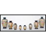 A collection of Japanese Kutani vases to include a pair of baluster vases with scenes of Geisha
