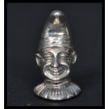 A sterling silver novelty pin cushion in the form of Mr Punch. Weighs 14.2 grams.