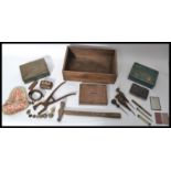A collection of vintage items dating from the 19th century to include leather working tools