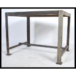 A stunning vintage 20th century industrial large metal factory worktop / bench, raised on square