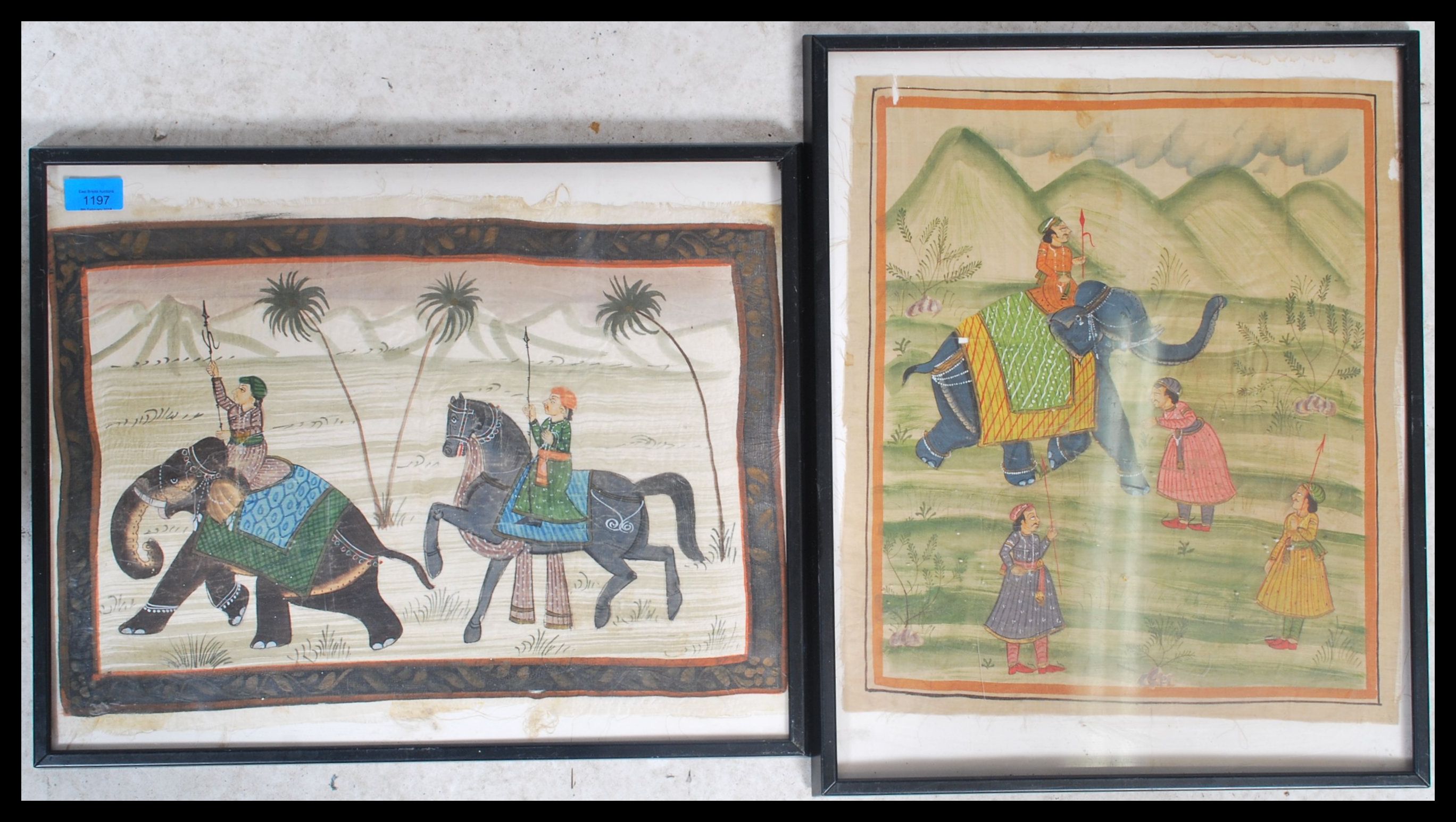 A framed and glazed Rajasthani hand painted on silk paintings depicting Moghul warriors and