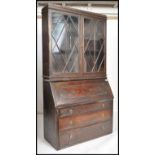 A 19th century flame mahogany bureau bookcase, ast