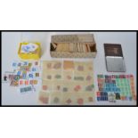 A collection of vintage 20th century World stamps to include unused stamps, kiloware and a box of