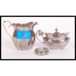 A silver hallmarked creamer Birmingham assay marks, makers marks for John Rose and dating to 1908