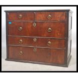 An 18th country oak and mahogany chest of drawers. The chest with two short drawers over deep fitted