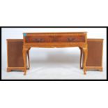 A vintage 20th century a mahogany and burr walnut quarter panel veneer radiogram stereo-gram