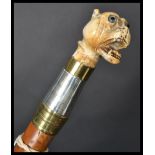 A 19th century Victorian silver walking stick cane having a tapering malacca shaft with silver