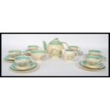 A 1930's Susie Cooper Dresden Spray six person tea service set consisting of six cups saucers and