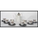 A retro 20th century 1970s coffee service in the Ballerina pattern, consisting of coffee pot, cups