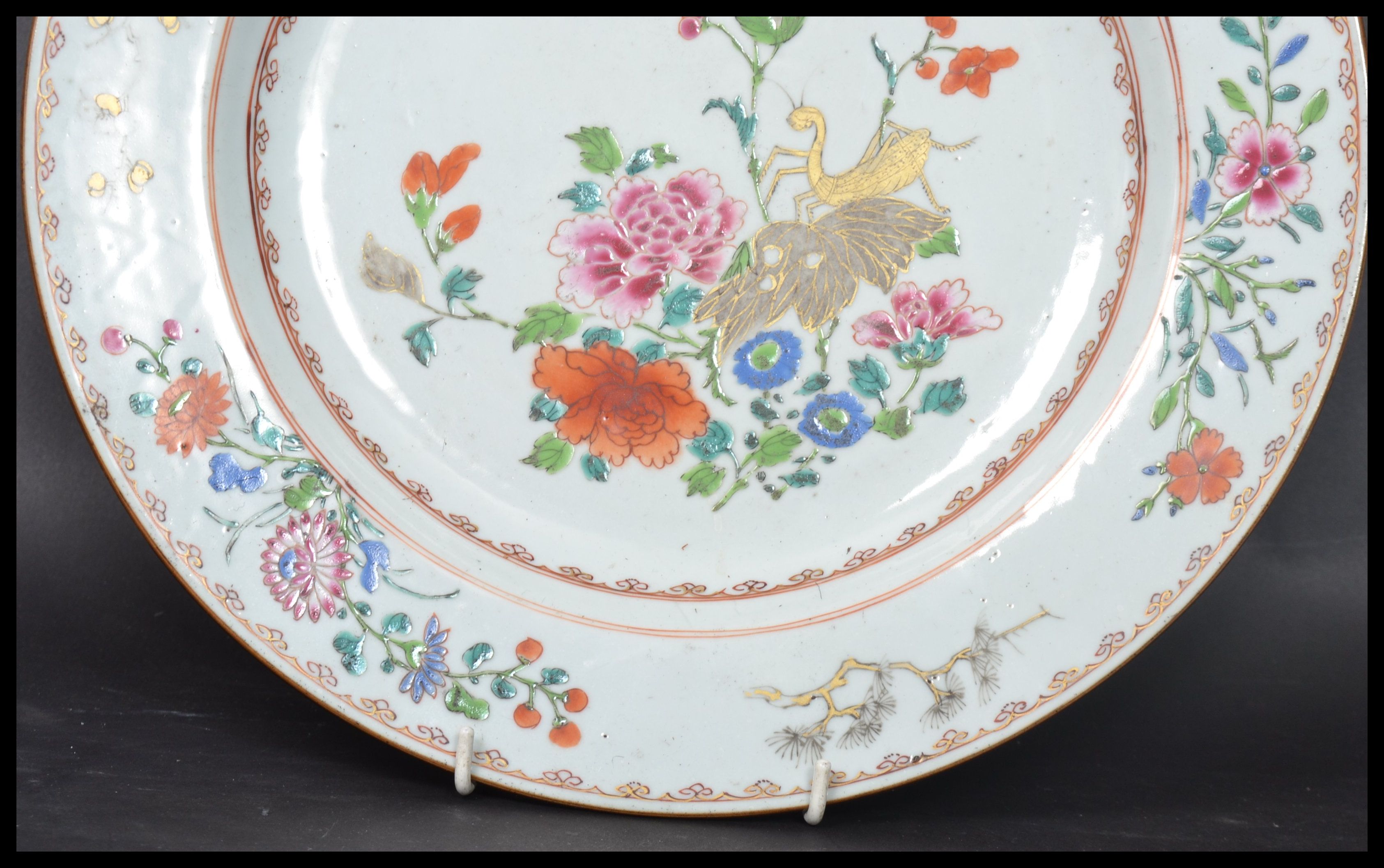 An 18th century Chinese Qing Long Famille Rose plate hand painted with enamels depicting floral - Image 6 of 8