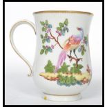A Chelsea bell shape  tankard hand painted with birds of paradise, gilt to the rim with anchor