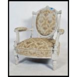 A 19th century French fauteuil armchair recently being up - cycled with a shabby chic finish and