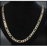A hallmarked 9ct gold Figaro chain necklace having a lobster claw clasp. Measures 27 inches.