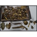A large collection of varied period brass furniture castors, knobs and fittings.