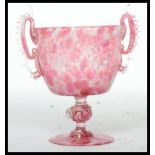 A stunning early 20th century Murano studio art twin handled mottled pink  glass chalice raised on a