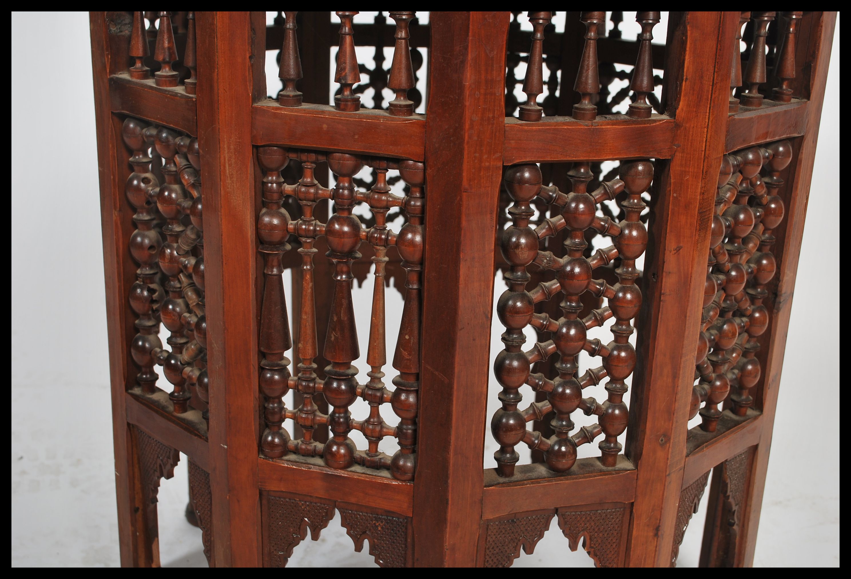 A Moroccan wooden occasional wine table having twelve sides. The dodecagonal top supported by 12 - Image 4 of 4