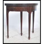 An early 20th century Georgian style mahogany demi - lune side table / card table, flip over top