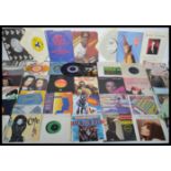 Vinyl records A collection of 45rpm vinyl 7" record singles from the 1970s and 1980s featuring