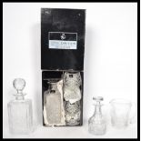A collection of Edinburgh cut glass crystal together with a boxed Royal Doulton decanter and