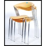Erla sólveig óskarsdóttir - A set of four contemporary stacking Dreki chairs having yellow plastic