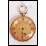 An 18ct gold continental pocket watch having a gilt dial with Roman numeral chapter ring and faceted