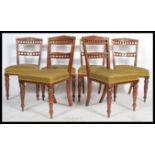 A set of six early 20th century Edwardian oak dining chairs, overstuffed seats, gallery spindle back