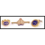 A Royal Navy bar brooch in enamel with yellow metal together with a pair of Naval cufflinks in