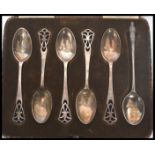 A group of silver hallmarked teaspoons to include a set of five Walker and Hall, Sheffield assay