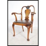 A 20th century Queen Anne revival desk / elbow office chair, being raised on cabriole legs, brown