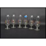 A set of six vintage retro 20th century matching continental beer glasses each finished with a