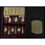 A cased set of 20th century silver hallmarked tea spoons by A J Bailey bearing Birmingham assay