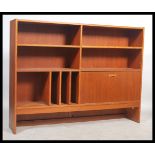 A 1970's retro Clausen & Co of Denmark teak wood entertainment cabinet having a series of shelves