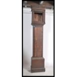 An 18th / 19th century longcase - grandfather clock case in country oak complete with the hood (