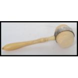 A 19th century Masonic interest ivory gavel having silver plated mounts. The handle of turned