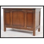 A 19th century Victorian oak coffer chest blanket box raised on square legs. The hinged lid