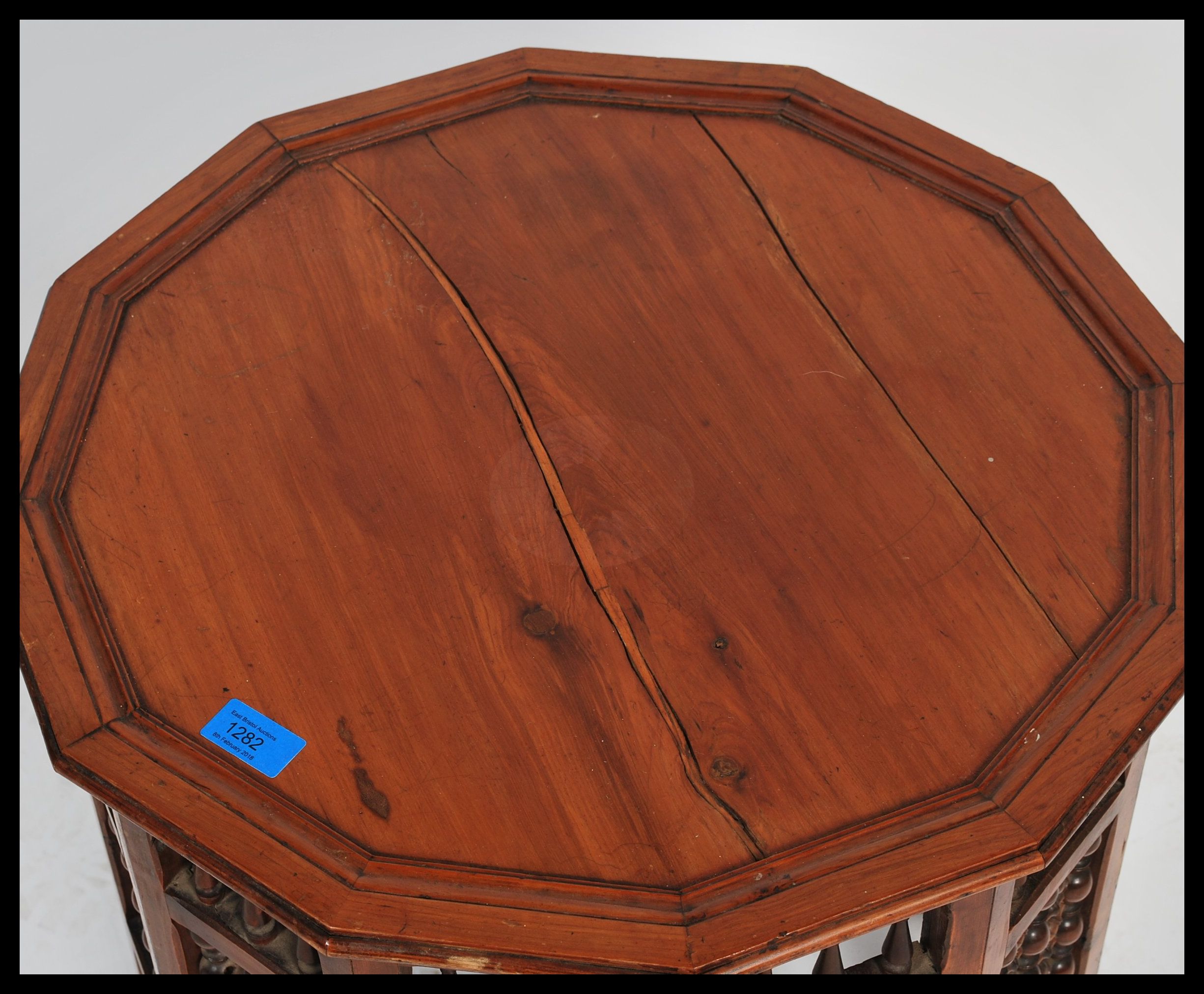 A Moroccan wooden occasional wine table having twelve sides. The dodecagonal top supported by 12 - Image 3 of 4