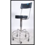 A good mid century /- 1970's Industrial medical surgeons theatre stool. Polished chrome construction