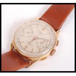 Chronographe Suisse - Gentleman's 18k gold case chronograph wristwatch, the signed silvered dial