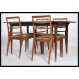 A 1960's mid century teak wood McIntosh of Kirkcaldy dining room suite. The teak extending dining