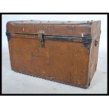An early 20th century vintage grained tin / tack trunk with lock to front with fitted hinged top