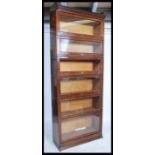 An Edwardian Indutrial Lebus mahogany 6 section - stack lawyers stacking bookcase cabinet. The