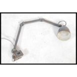 A 1950's mid century Industrial anglepoise factory work lamp light. The desk light with pendant