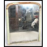 A large and impressive heavy 19th century overmantel mirror. Of arched form the heavy mirror glass
