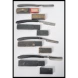 A group of four 19th and 20th century cased cut throat razors to include Wingfield and Rowbotham,