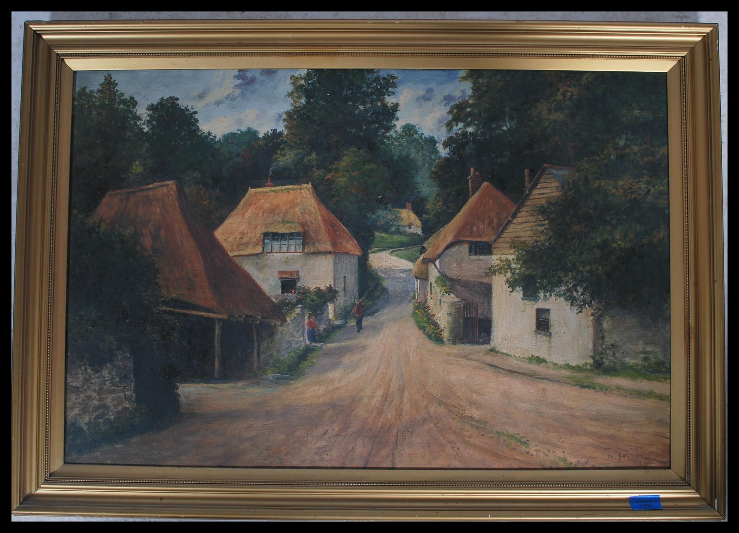 An early 20th century English school oil on canvas painting of a rural country scene depicting an