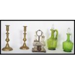 Two 19th century green glass hand blown decanters together with a cut glass condiment set with