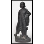 A 19th century Victorian cast iron door stop in the form of a gentleman / cavalier. Measures 27 cm