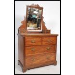 A 19th century Victorian mahogany dressing table chest. Raised on plinth base with a series of short