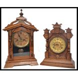 Two vintage early 20th century mantel clocks, both set with eight day movements and retaining