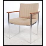 A retro 1960's teak and chrome desk office chair. Raised on chrome tubular metal frames with wool